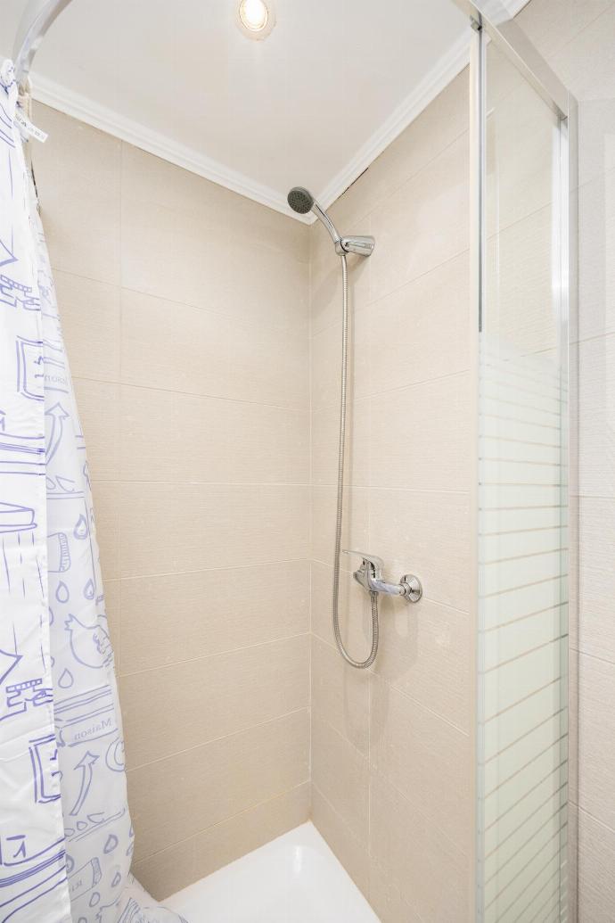En suite bathroom with shower . - Levrecchio Beach Cottage . (Photo Gallery) }}