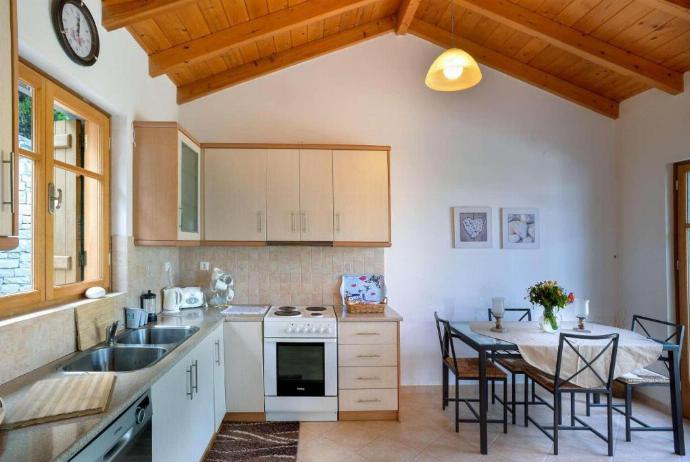 Equipped kitchen, and dining area . - Villa Levrecchio . (Photo Gallery) }}