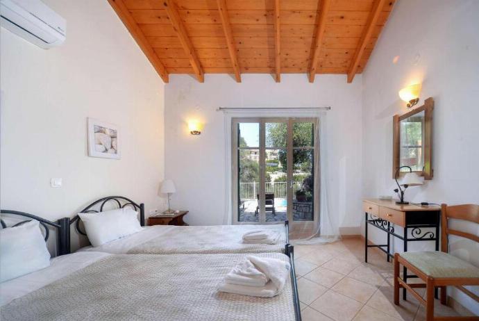 Twin bedroom with A/C . - Villa Levrecchio . (Photo Gallery) }}