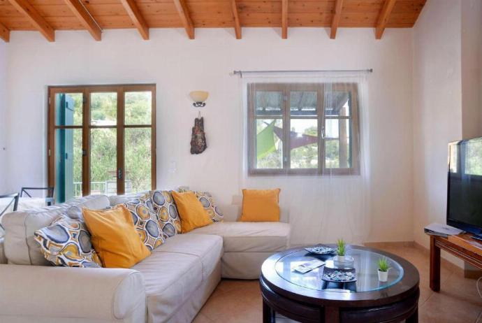 Open-plan living room with sofas, dining area, kitchen, A/C, WiFi internet, and satellite TV . - Villa Levrecchio . (Photo Gallery) }}