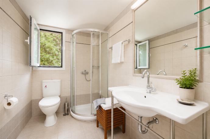 Family bathroom with shower . - Villa Jasmine . (Photo Gallery) }}
