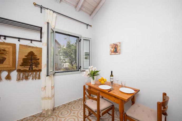 Open-plan cottage with double bed, dining area, kitchen, bathroom, A/C, WiFi internet, and TV . - Aimilia Cottage . (Photo Gallery) }}