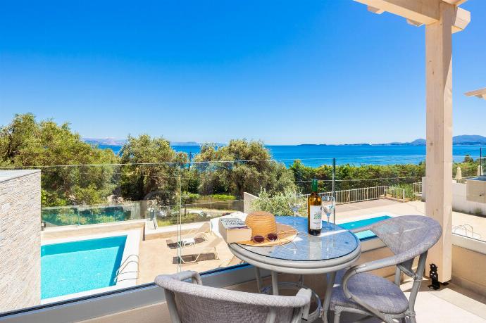Balcony area with sea views . - Villa Daisy . (Photo Gallery) }}