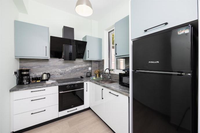 Equipped kitchen . - Villa Daisy . (Photo Gallery) }}