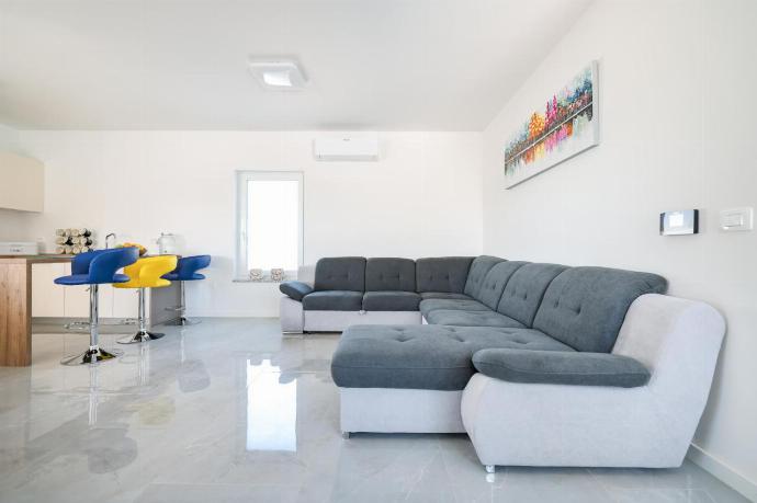 Open-plan living room with sofas, dining areas, kitchen, WiFi internet, satellite TV . - Villa Vesna . (Photo Gallery) }}