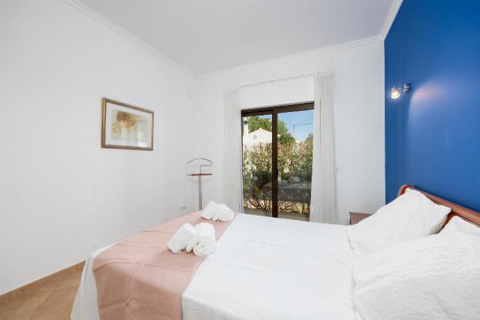 Double bedroom with A/C . - Villa Paraiso . (Photo Gallery) }}