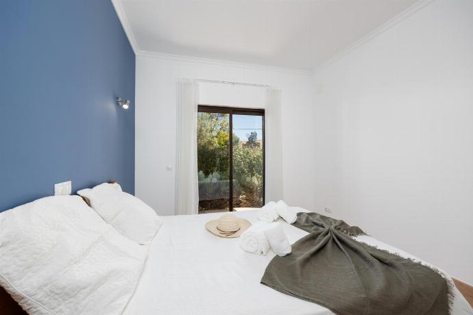 Double bedroom with A/C . - Villa Paraiso . (Photo Gallery) }}