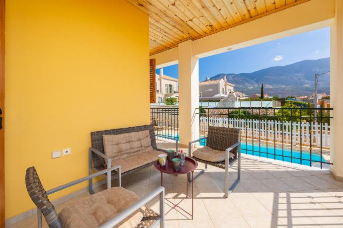 Sheltered terrace area . - Villa Nikos . (Photo Gallery) }}