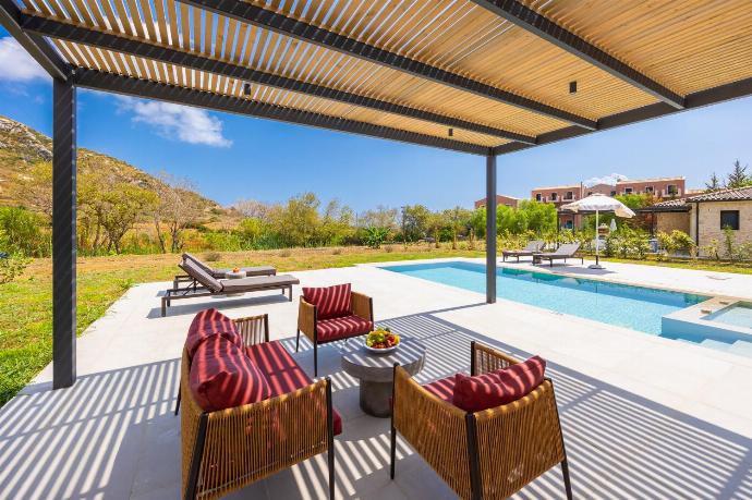 Sheltered terrace area . - Villa Lilia . (Photo Gallery) }}