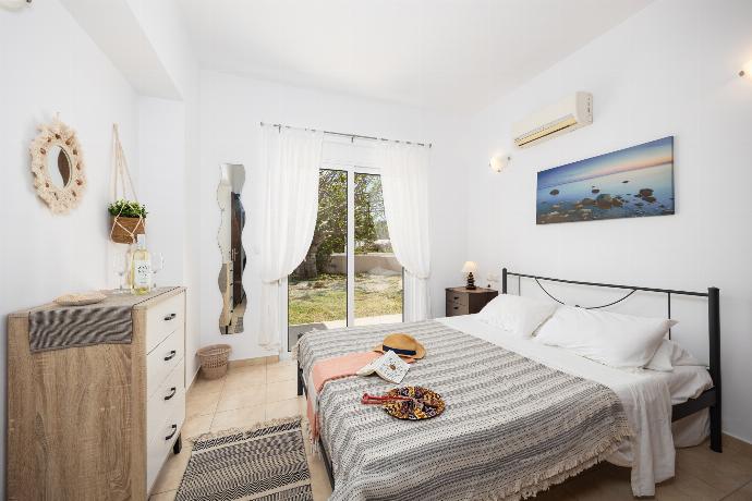 Double bedroom with A/C . - Villa Maia . (Photo Gallery) }}