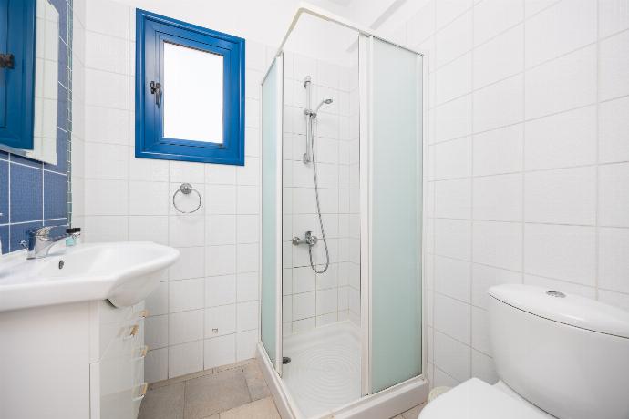 En suite bathroom with shower . - Villa Estia . (Photo Gallery) }}