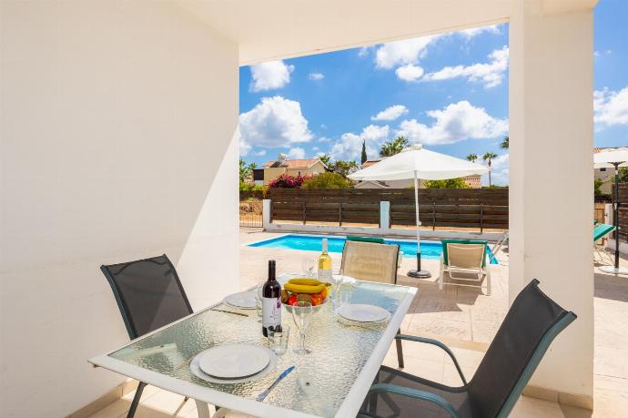 Sheltered terrace area . - Villa Coral Bay 7 . (Photo Gallery) }}