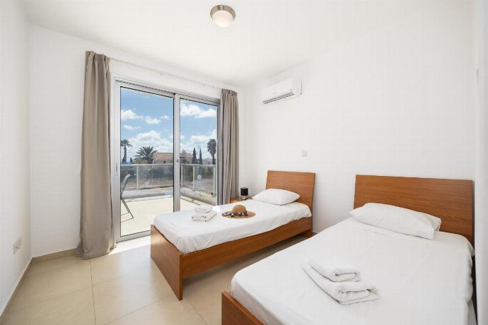 Twin bedroom with A/C . - Villa Coral Bay 7 . (Photo Gallery) }}