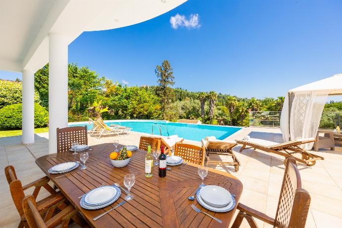 Sheltered terrace area . - Villa Noulia . (Photo Gallery) }}