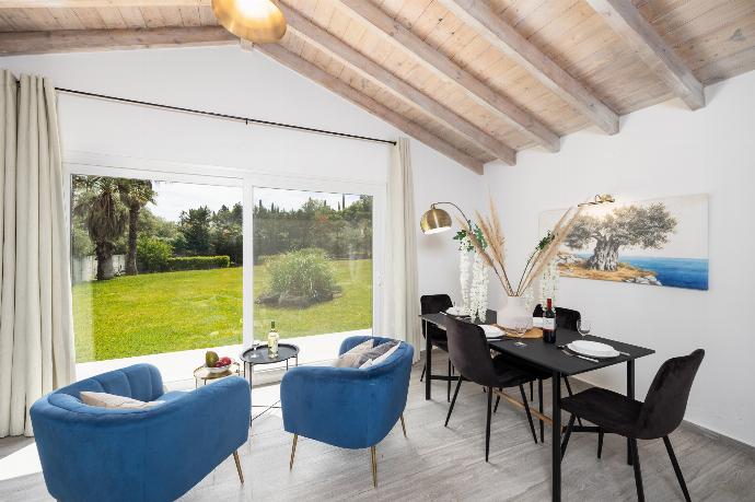 Studio apartment in annex with double bed, living area, dining area, kitchen, en suite bathroom, A/C, WiFi internet, and satellite TV . - Villa Noulia . (Photo Gallery) }}