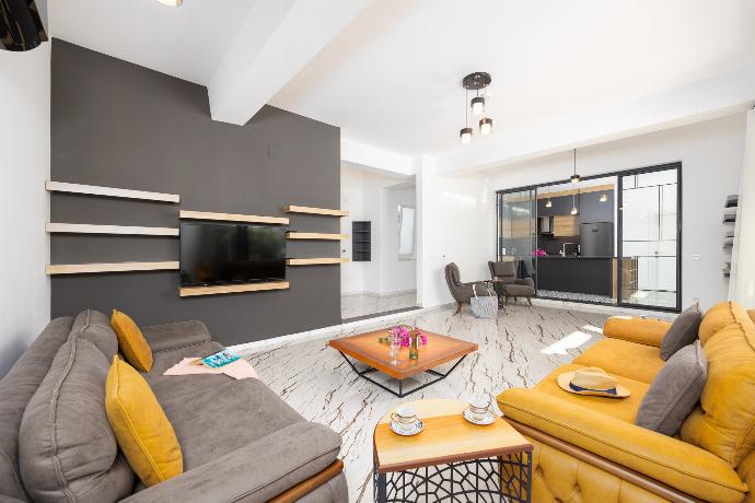 Living room with sofas, A/C, WiFi internet, and satellite TV . - Villa White Cloud . (Photo Gallery) }}