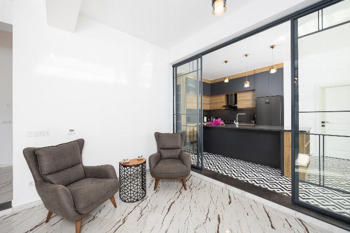 Living room with sofas, A/C, WiFi internet, and satellite TV . - Villa White Cloud . (Photo Gallery) }}