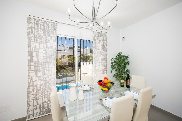 Living room with sofa, dining area, A/C, WiFi internet, and satellite TV . - Casa Eva . (Photo Gallery) }}