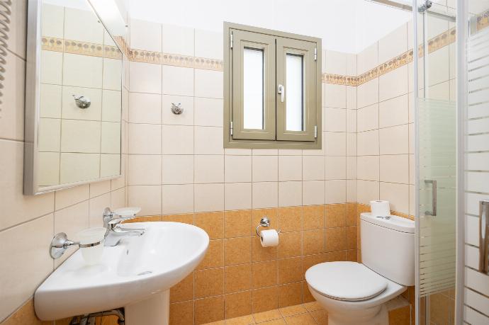 En suite bathroom with shower . - Villa Irineos . (Photo Gallery) }}
