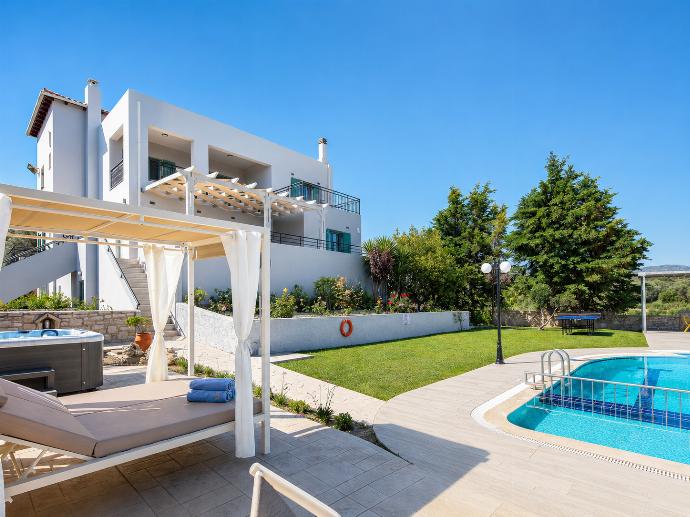 ,Terrace area with jacuzzi . - Villa Kyveli . (Photo Gallery) }}