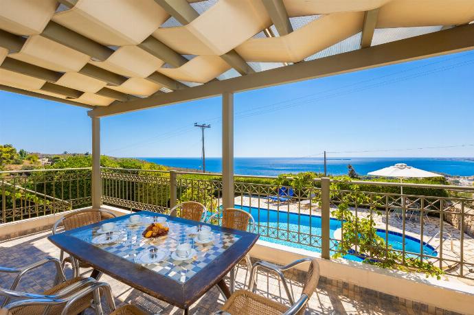 Sheltered terrace area with sea views . - Villa Penelope Sea View . (Photo Gallery) }}