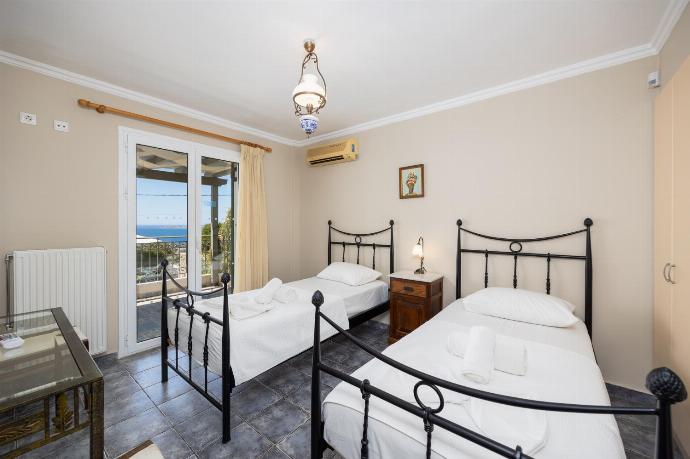 Twin bedroom with A/C and sea views . - Villa Penelope Sea View . (Photo Gallery) }}