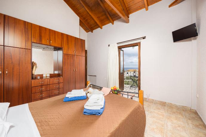 Unit 2: double bedroom with A/C . - Panorama II Villas . (Photo Gallery) }}