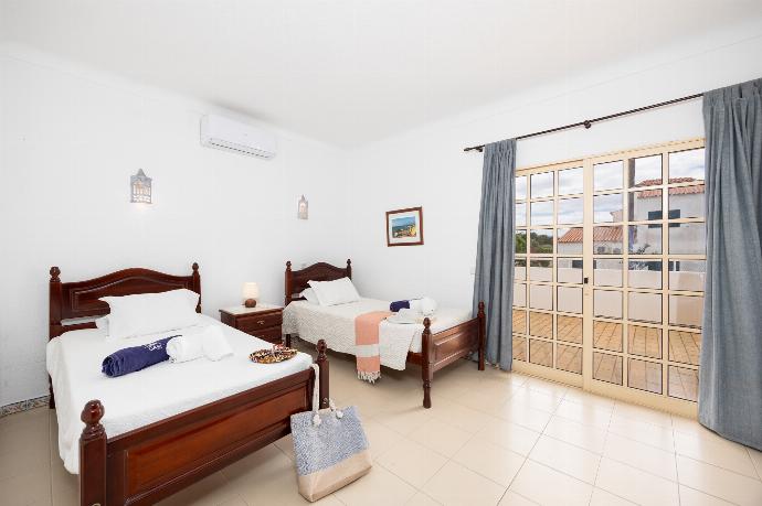 Twin bedroom with A/C . - Villa Baltin . (Галерея фотографий) }}