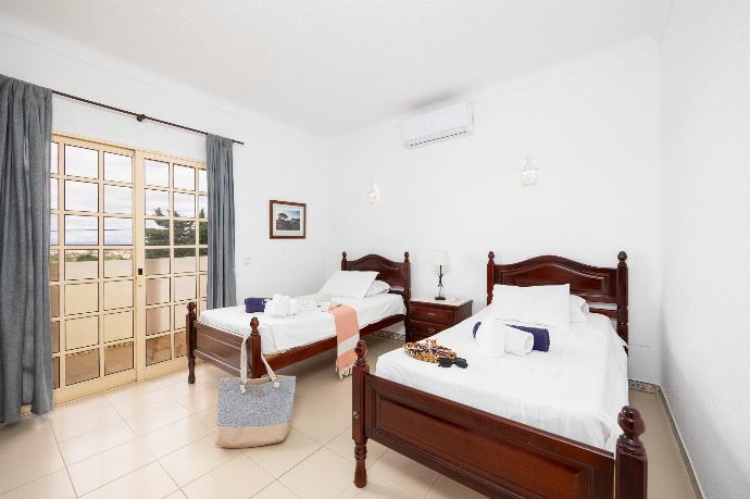 Twin bedroom with A/C . - Villa Baltin . (Галерея фотографий) }}