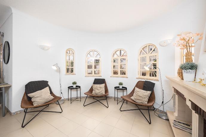 Living room with sofas, dining area, ornamental fireplace, A/C, WiFi internet, and satellite TV . - Villa Baltin . (Галерея фотографий) }}