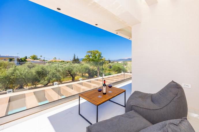 Balcony area . - Villa Infinity Theo . (Photo Gallery) }}