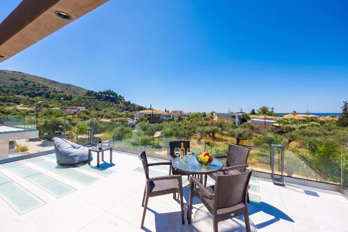 Roof terrace area . - Villa Infinity Theo . (Photo Gallery) }}