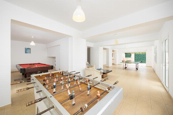 Games room with living area, pool table, foosball table, and table tennis . - Villa Doreta . (Photo Gallery) }}