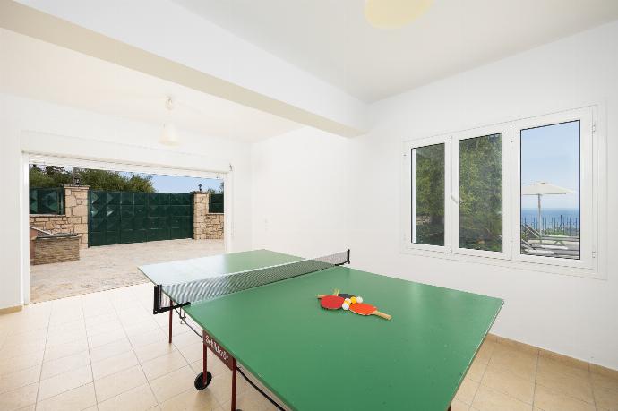 Games room with living area, pool table, foosball table, and table tennis . - Villa Doreta . (Photo Gallery) }}