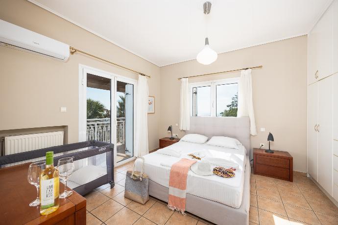 Double bedroom with A/C . - Villa Doreta . (Photo Gallery) }}