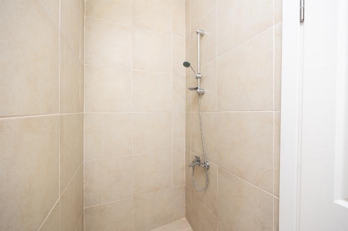 En suite bathroom with shower . - Four Seasons Villa . (Photo Gallery) }}