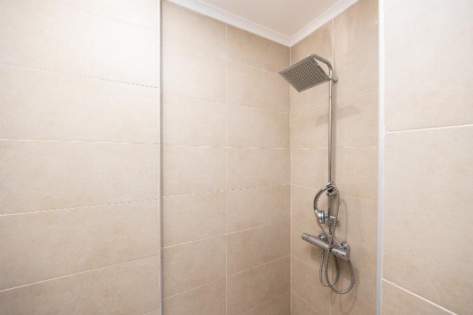 En suite bathroom with shower . - Four Seasons Villa . (Photo Gallery) }}