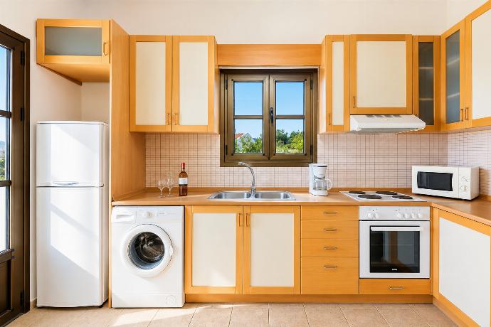 Equipped kitchen . - Villa Athina . (Photo Gallery) }}