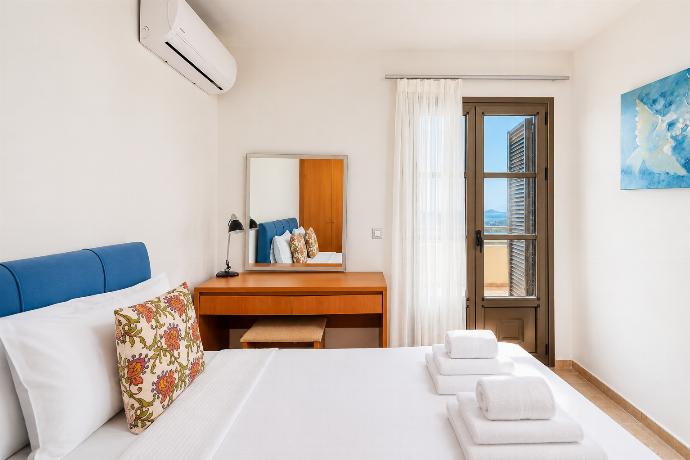 Double bedroom with A/C . - Villa Athina . (Photo Gallery) }}