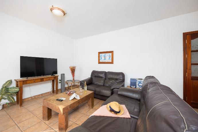 Living room with sofas, dining area, A/C, WiFi internet, and satellite TV . - Villa Diama . (Photo Gallery) }}