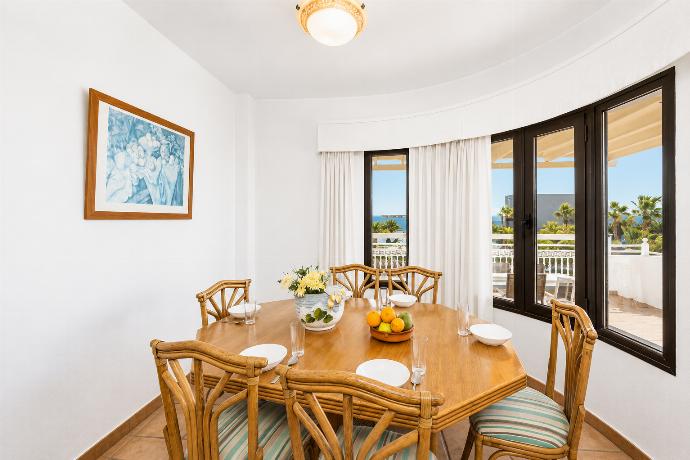 Living room with sofas, dining area, A/C, WiFi internet, and satellite TV . - Villa Diama . (Photo Gallery) }}