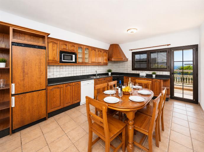 Equipped kitchen with dining area . - Villa Diama . (Photo Gallery) }}