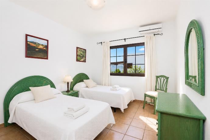 Twin bedroom with A/C . - Villa Diama . (Photo Gallery) }}