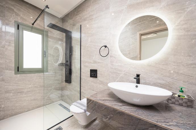 En suite bathroom with shower . - Villa Tania Ena . (Photo Gallery) }}