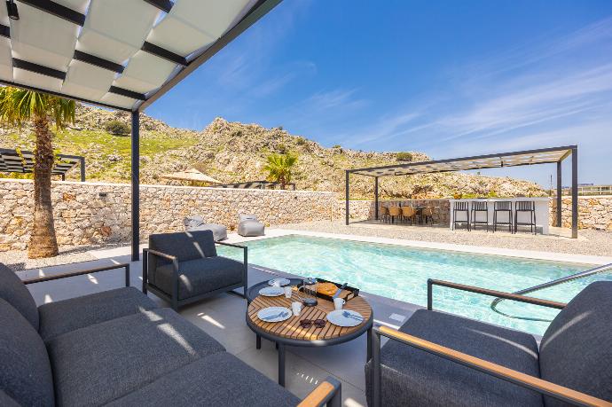Sheltered terrace area . - Villa 12 Chado . (Photo Gallery) }}