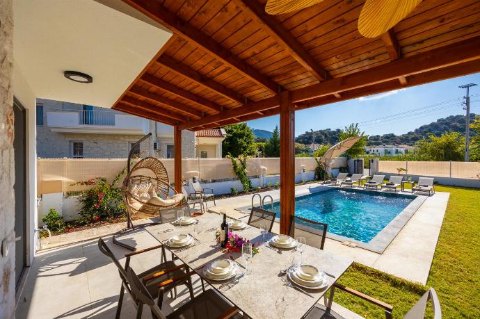 Sheltered terrace area . - Villa Lidya . (Photo Gallery) }}