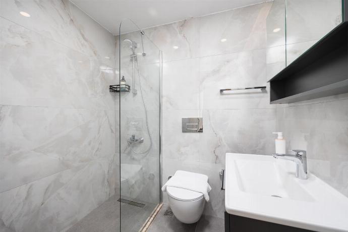 En suite bathroom with shower . - Villa Lidya . (Photo Gallery) }}