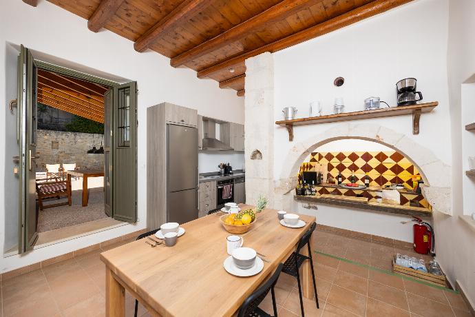Main building: Dining area . - Villa Nafsika . (Photo Gallery) }}