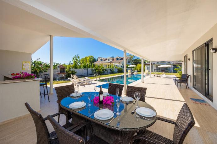 Sheltered terrace area of main building . - Villa Tolga . (Photo Gallery) }}
