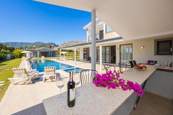 Shelters terrace area of main building . - Villa Tolga . (Photo Gallery) }}